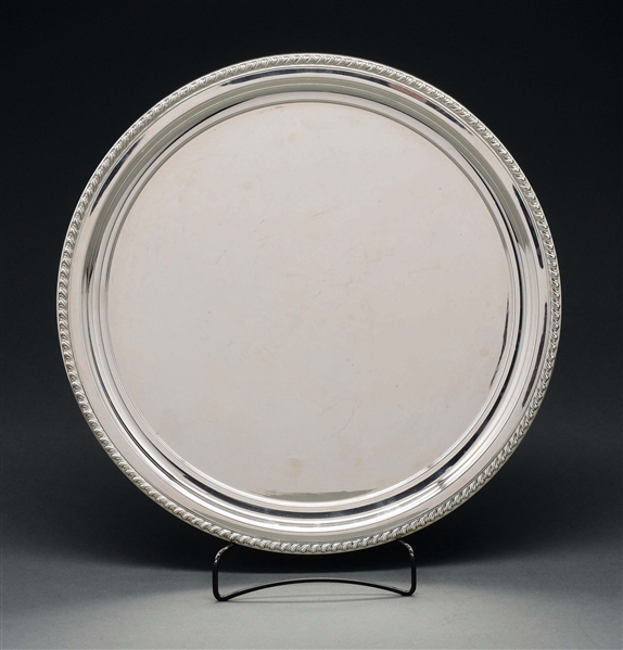 AN AMERICAN STERLING ROUND TRAY. 