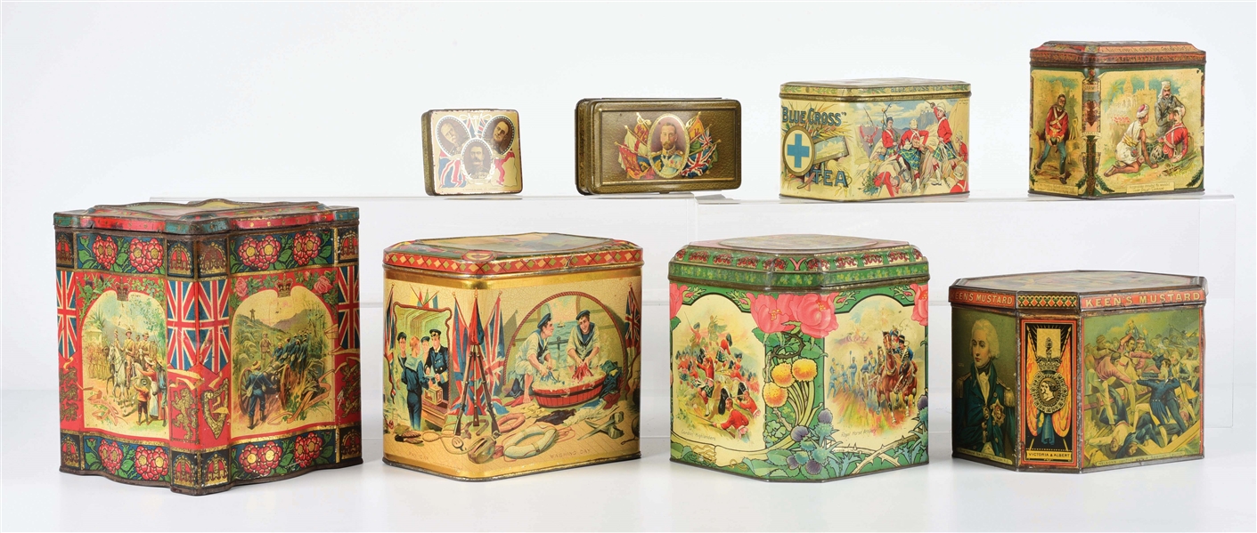 LOT OF 8: MILITARY-THEMED BISCUIT TINS.