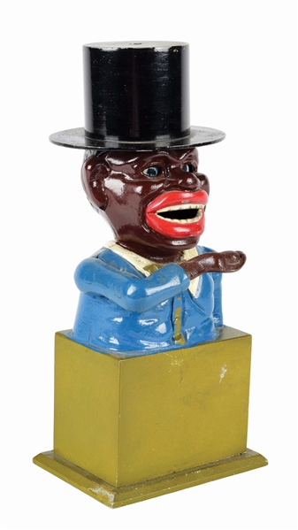 JOLLY "N" IN HIGH HAT ON PEDESTAL CAST IRON MECHANICAL BANK.
