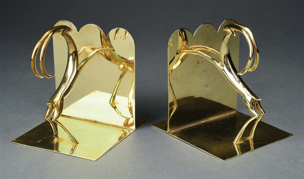 KARL HAGENAUER PAIR OF IMPALA BRASS BOOKENDS.