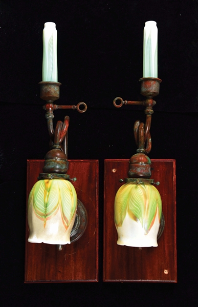 LOT OF 2: PAIR OF TIFFANY STUDIOS CAST BRONZE AND FAVRILE GLASS WALL SCONCES.