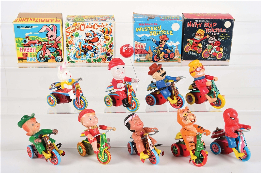 LOT OF 9: MISCELLANEOUS MARX AND JAPANESE WIND-UP TRICYCLE TOYS.