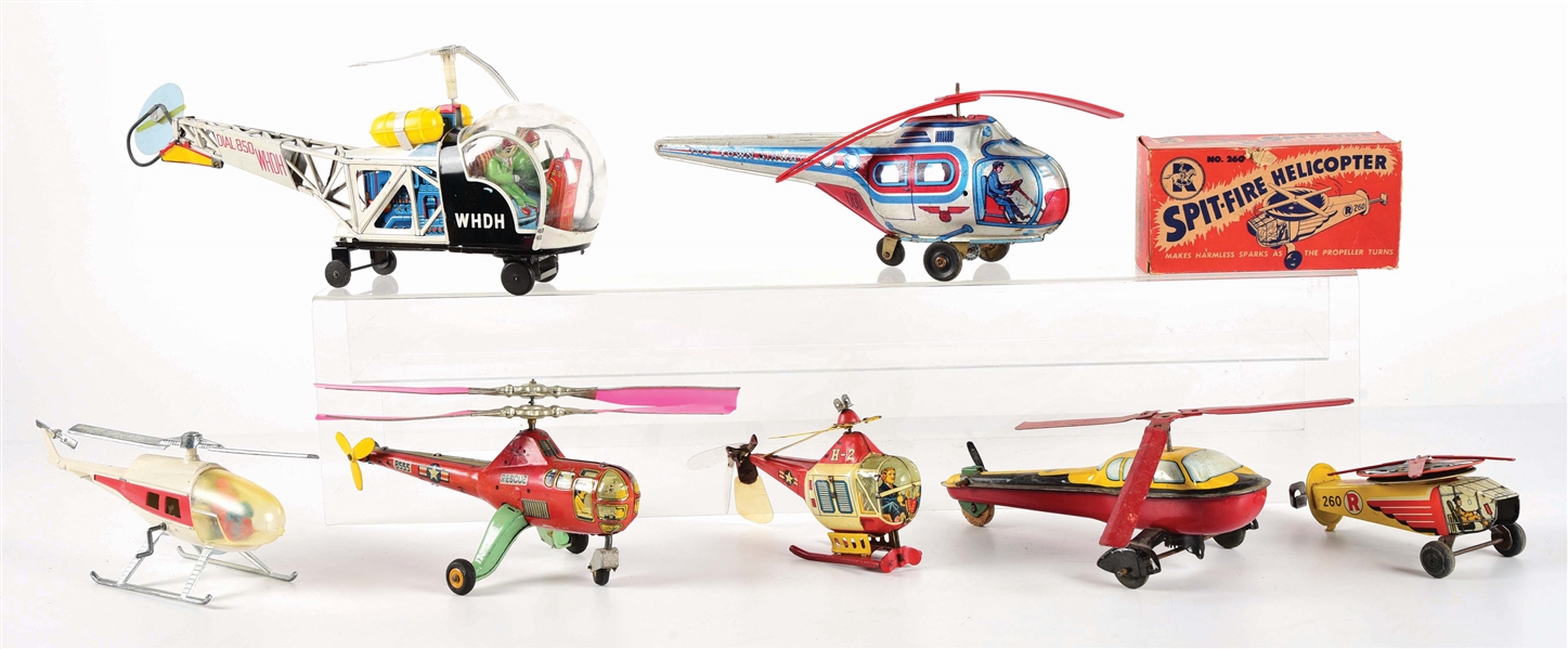 LOT OF 7: VARIOUS AMERICAN AND JAPANESE MADE HELICOPTER TOYS.