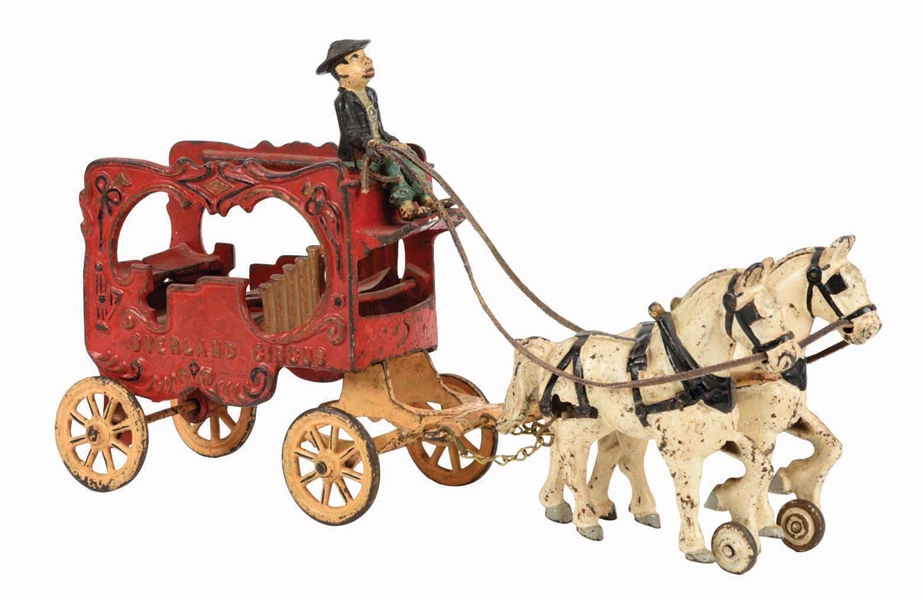 EARLY CAST IRON HORSE DRAWN OVERLAND CIRCUS WAGON.
