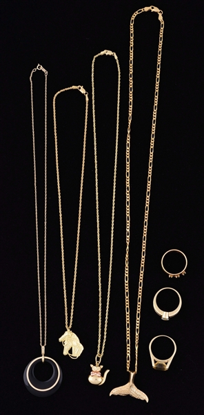 LOT OF 7: FOUR 14K GOLD NECKLACES AND THREE 14K GOLD RINGS.