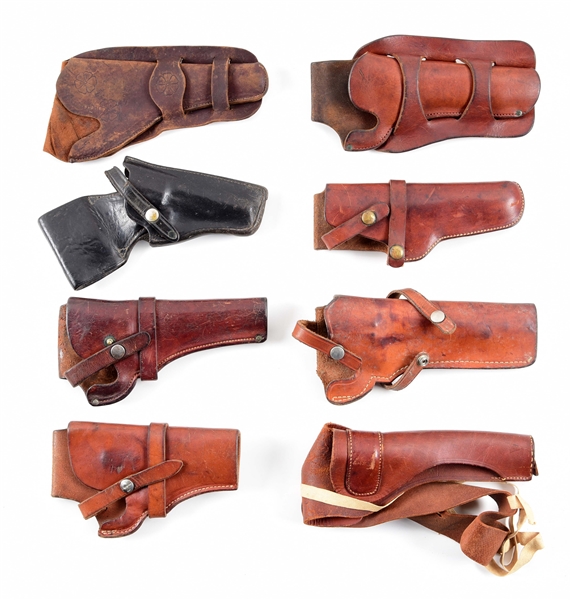 LOT OF 8: LEATHER REVOLVER HOLSTERS.