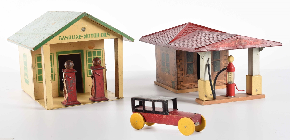 LOT OF 3: AMERICAN MADE TIN LITHO, WOODEN AND CAST IRON GAS STATION BUILDINGS AND AUTO.