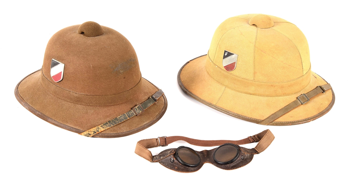 LOT OF 3: GERMAN WWII HEER PITH HELMETS AND GOGGLES.