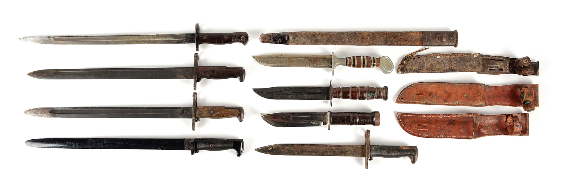 LOT OF 8: US WWI AND WWII FIGHTING KNIVES AND BAYONETS.