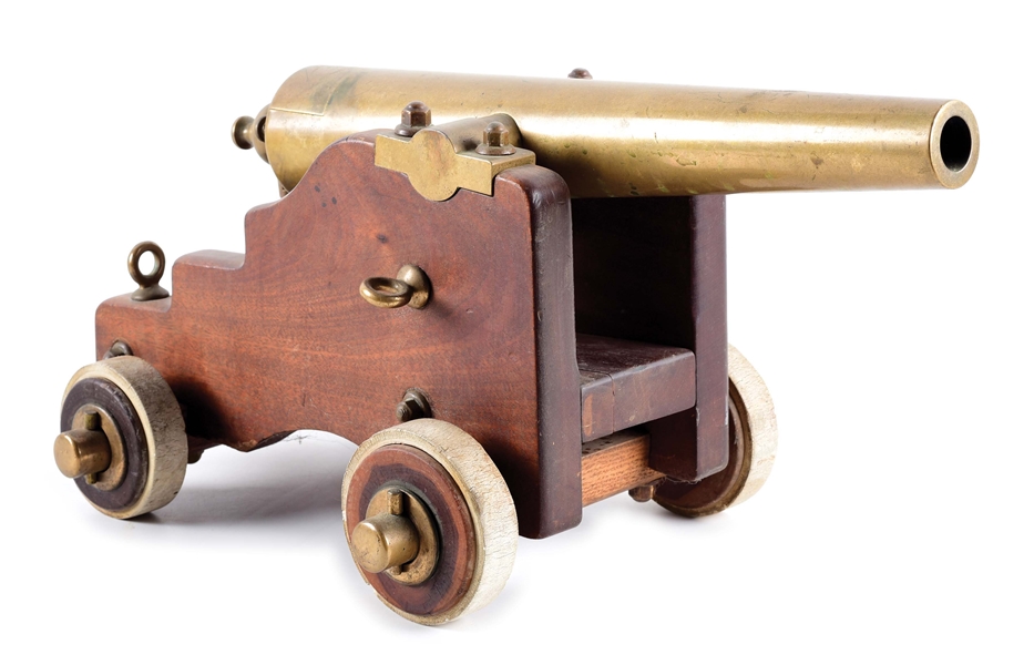 DELIGHTFUL L.T. SNOW STRONG BRASS SIGNAL CANNON ON WOOD CARRIAGE.