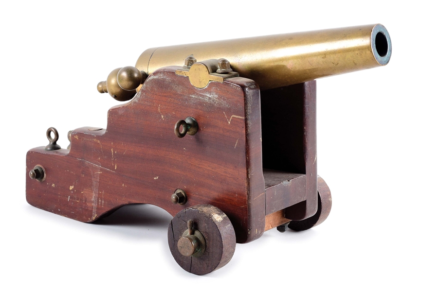 R.H. BROWN & CO. SMALL BRASS CANNON WITH NAVAL STYLE CARRIAGE