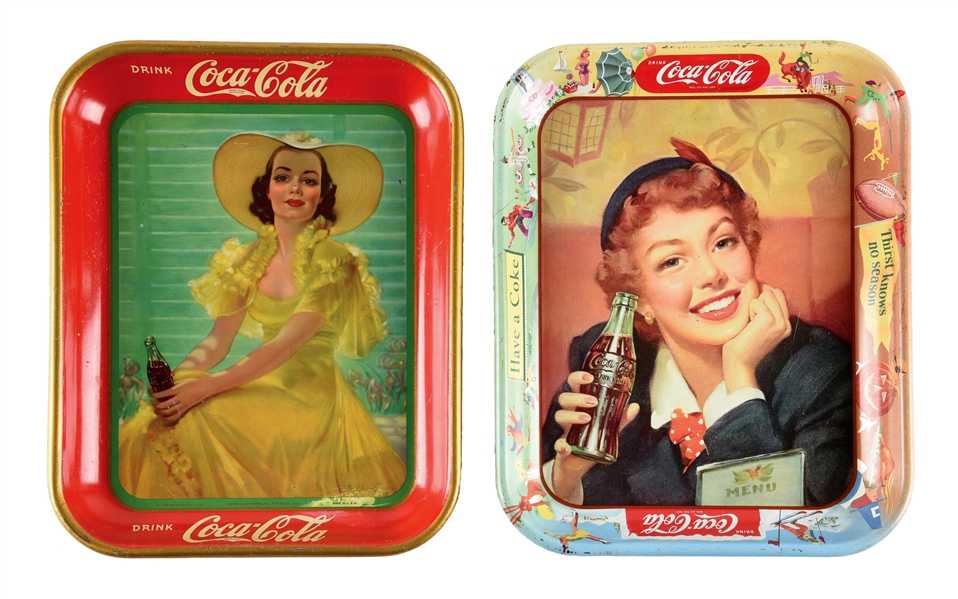 A PAIR OF COCA-COLA BOTTLE TRAYS.