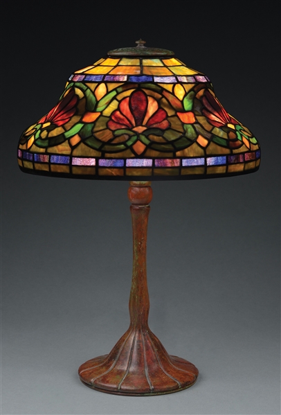 TIFFANY STUDIOS BRONZE BASE WITH EARLY 20TH CENTURY LEADED GLASS SHADE.