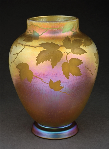 TIFFANY STUDIOS IRIDESCENT VASE WITH ETCHED LEAVES.