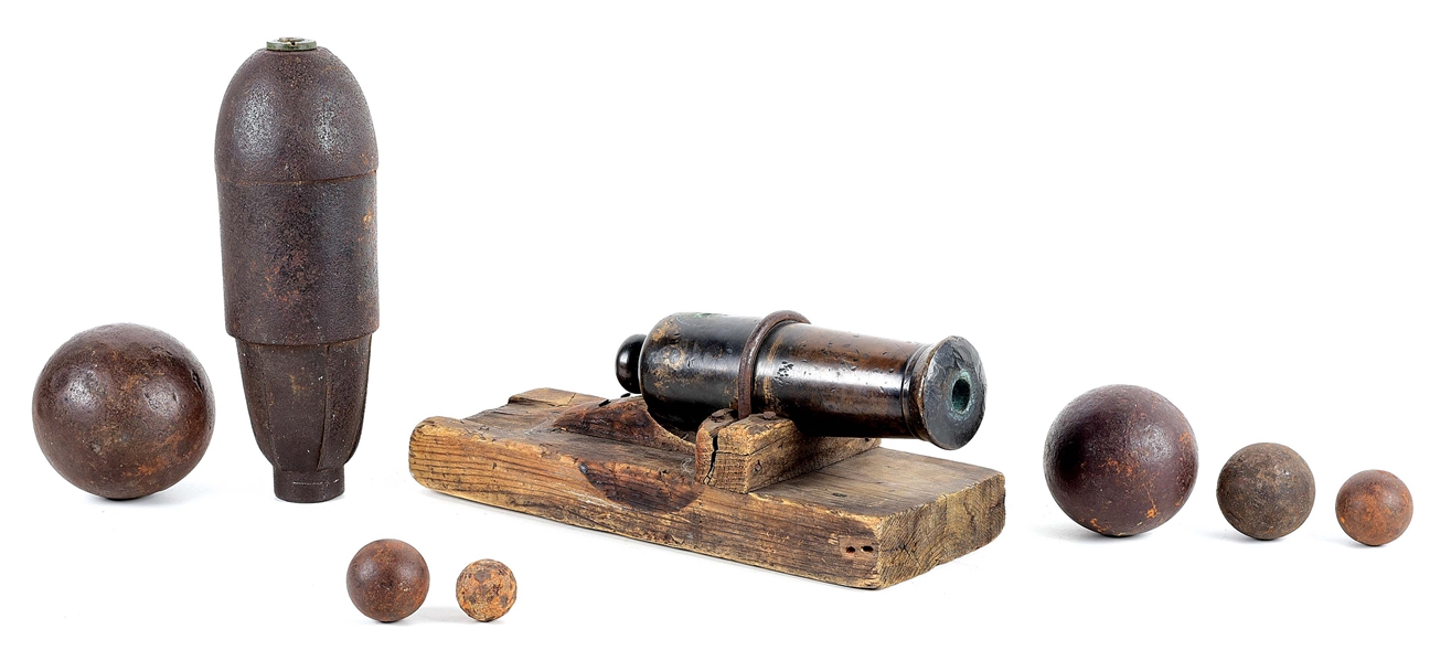 LOT OF 8: CIVIL WAR SCHENKL SHELL AND PATENT FUZE, WITH SIGNAL GUN, CANNON BALLS.