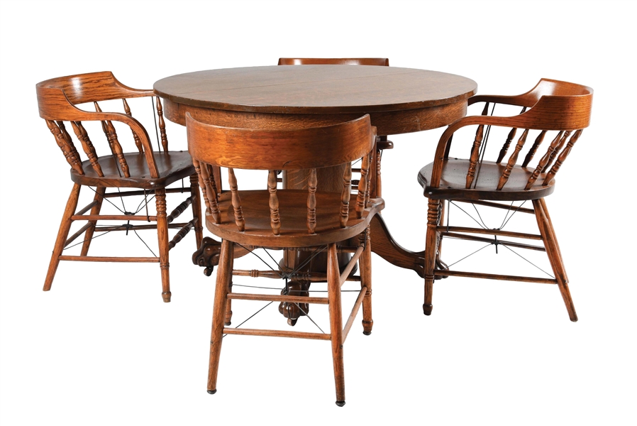 CLAW FOOT TIGER OAK DINING TABLE WITH 4 CHAIRS.