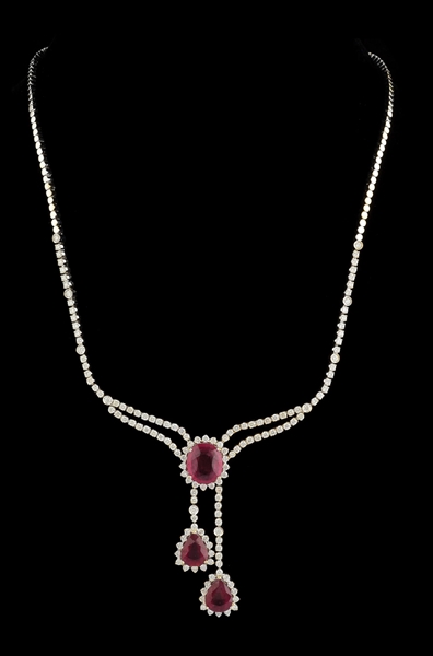 18K WHITE GOLD TREATED RUBY AND DIAMOND NECKLACE.