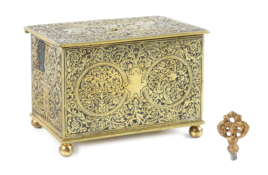 A BRASS LOCKBOX WITH FLORAL AND MYTHICAL DECORATIONS IN THE NUREMBERG STYLE.