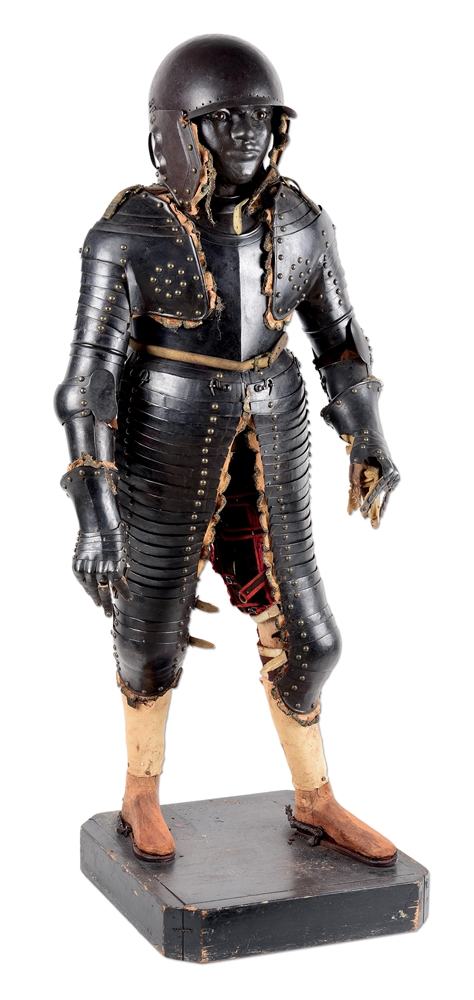 A SUIT OF GERMAN THREE QUARTERS PAGES ARMOR CIRCA 1620, EX. BASHFORD DEAN AND EX. SELDEN COLLECTIONS, EXHIBITED AT THE METROPOLITAN MUSEUM OF ART.