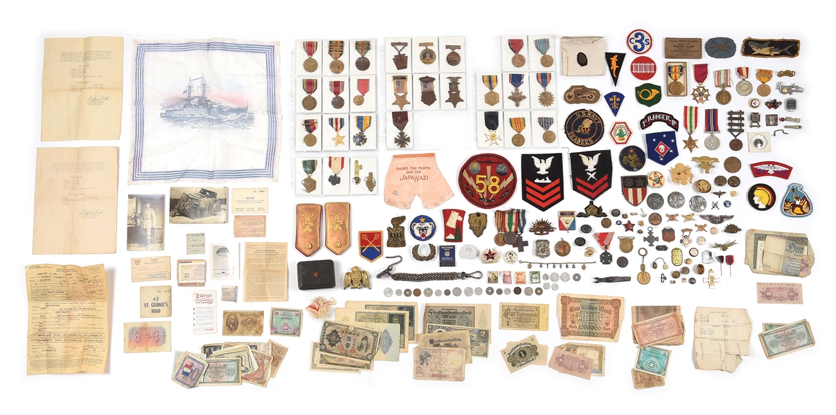 LARGE LOT OF MISCELLANEOUS US WWI-WWII AND FOREIGN MILITARY PATCHES, BADGES, AND INSIGNIA.