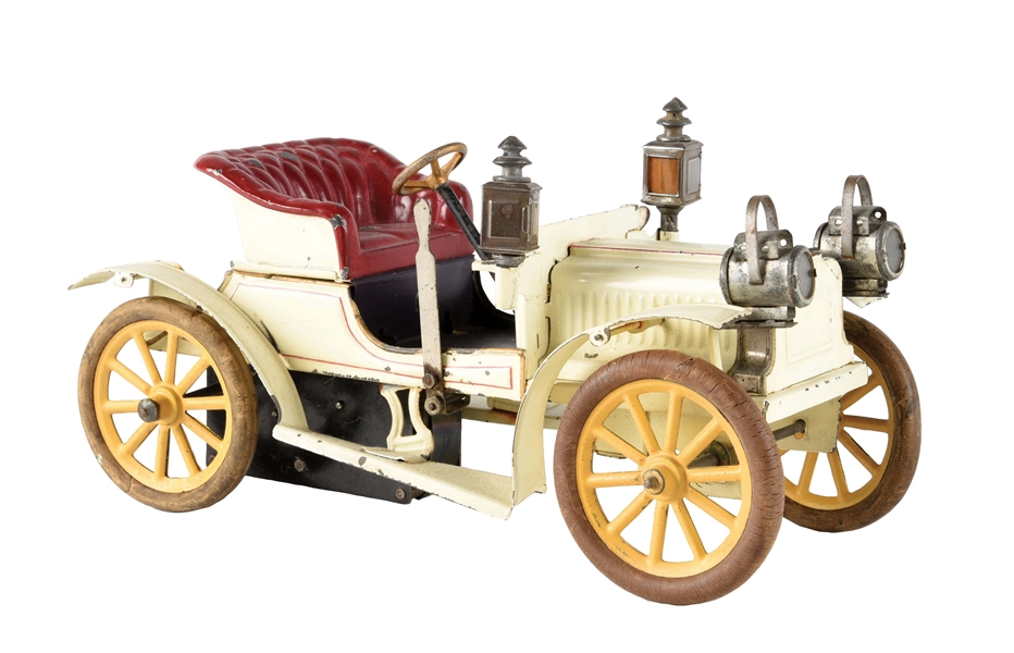 EARLY GERMAN CARETTE HAND-PAINTED OPEN TOURING CAR TOY.