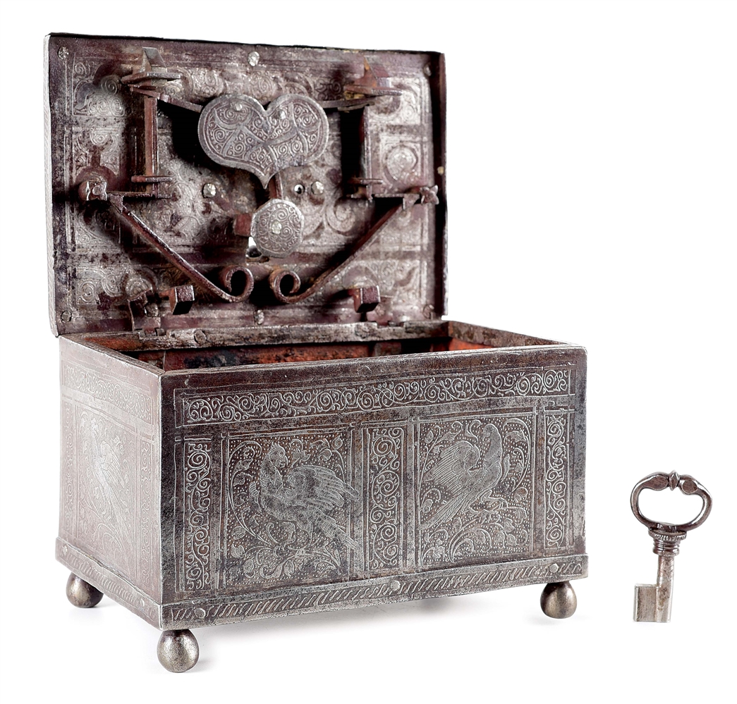 WROUGHT IRON NUREMBERG STRONGBOX ETCHED WITH FLORALS AND MYTHICAL AVIANS.