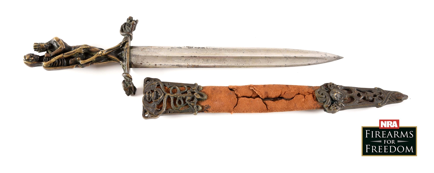 FANTASY DESIGNED BRASS HANDLED DAGGER WITH MATCHING LEATHER AND BRASS SCABBARD.