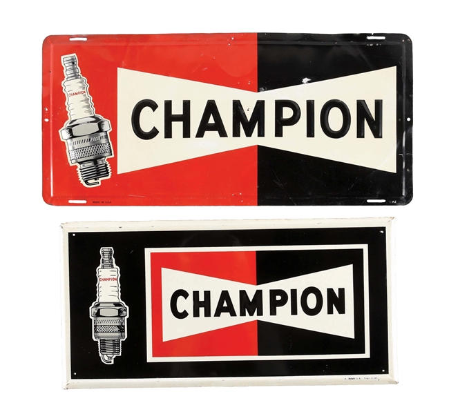 LOT OF 2: CHAMPION SPARK PLUGS EMBOSSED TIN SIGNS W/ SPARK PLUG GRAPHICS. 