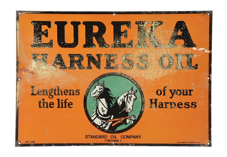 STANDARD OIL OF INDIAN EUREKA HARNESS OIL EMBOSSED TIN SIGN W/ HORSE GRAPHIC.