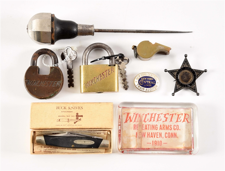 LOT OF 8: VARIOUS PIECES OF EPHEMERA INCLUDING WINCHESTER MEMORABILIA AND ENGRAVED SHERIFFS BADGE. 