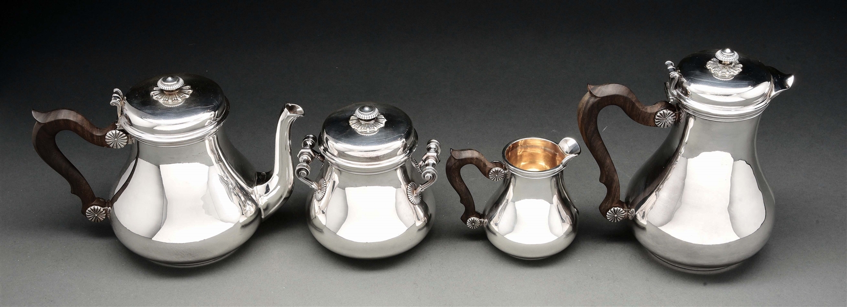 A FRENCH SILVER FOUR PIECE TEA AND COFFEE SERVICE. 