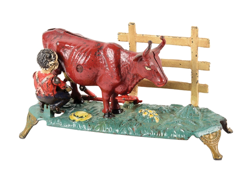 CAST IRON MILKING COW BANK.