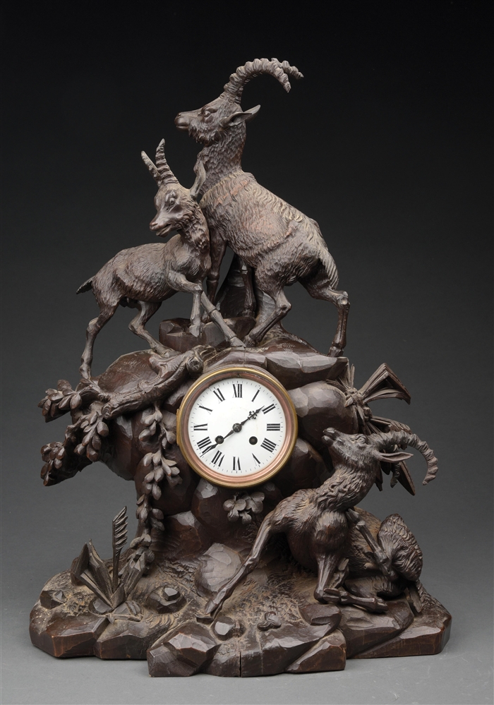 BLACK FOREST CARVED WOODEN CLOCK W/ CHAMOIS FIGURES.