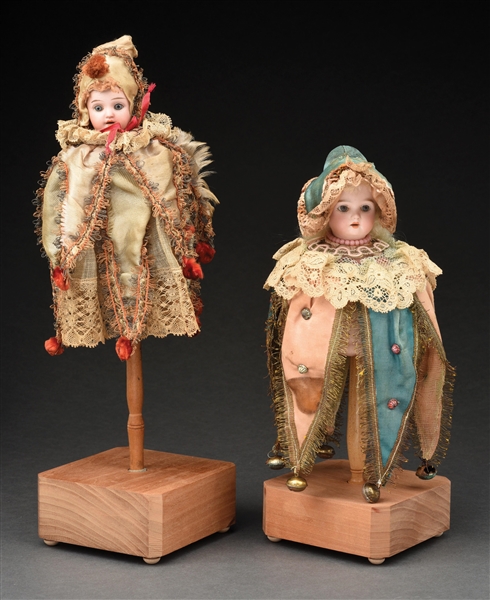 LOT OF 2: FRENCH 12" & 15" MUSICAL MAROTTE DOLLS ON STANDS.
