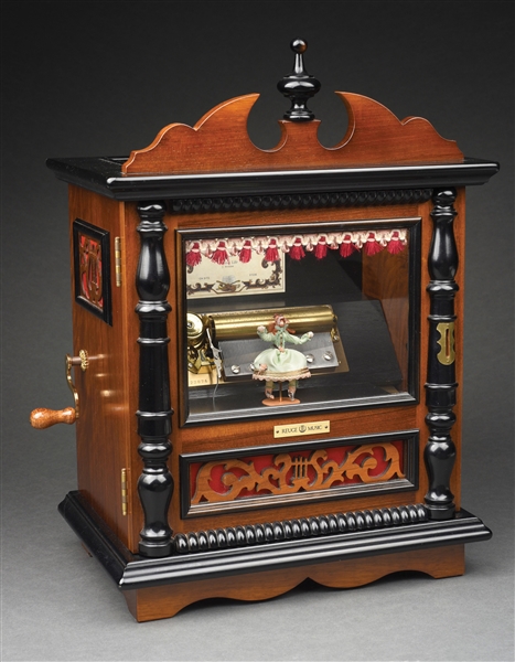 REUGE MUSIC COIN-OP AUTOMATON WITH DANCING GIRL.