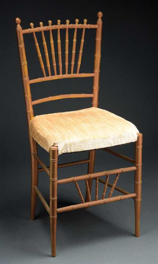 MUSICAL CHAIR WITH BAMBOO MOTIF.