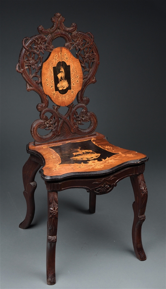 CARVED AND INLAYED ADULT MUSICAL CHAIR.