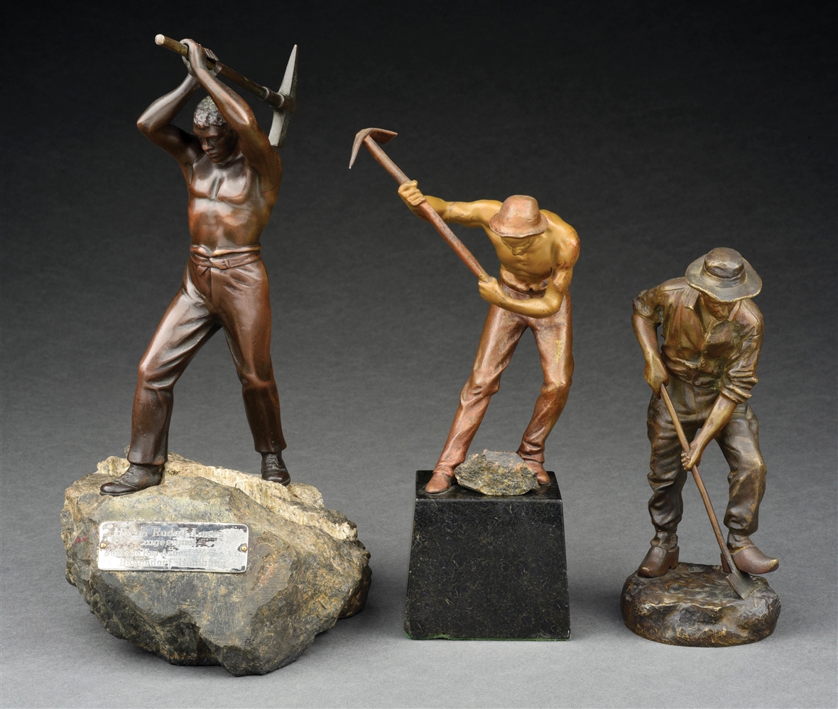 LOT OF 3: FIGURAL BRONZE SCULPTURES OF ROAD AND FIELD WORKERS.