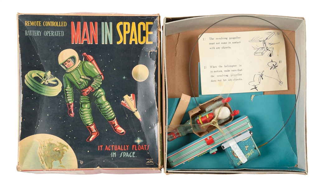 JAPANESE TIN LITHO BATTERY OPERATED MAN IN SPACE.