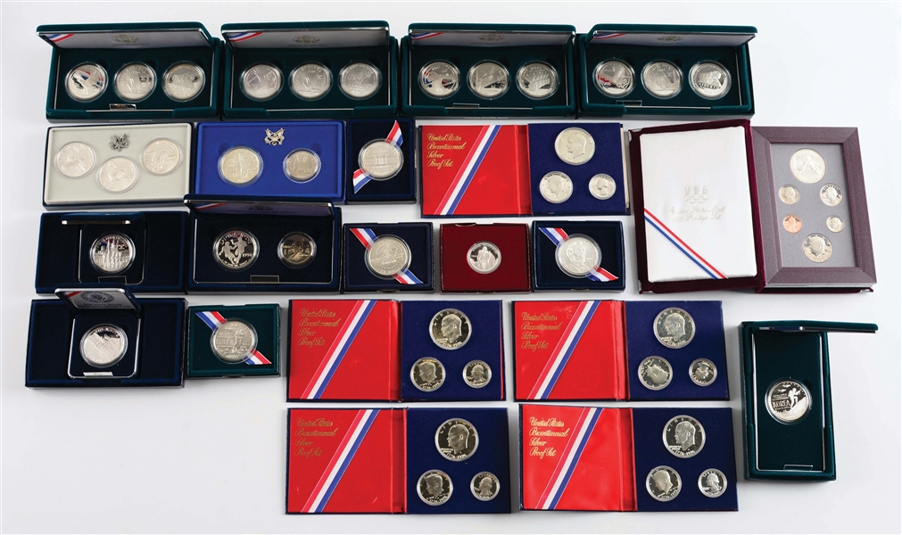 LOT OF 20 SETS OF COMMEMORATIVE COINS IN ORIGINAL BOXES W/ PAPERWORK.