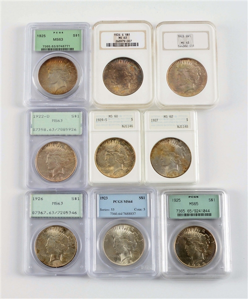 LOT OF 9: PEACE SILVER DOLLARS ALL GRADED.