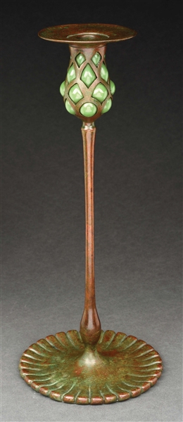TIFFANY STUDIOS BRONZE CANDLESTICK WITH BLOWN OUT GLASS.