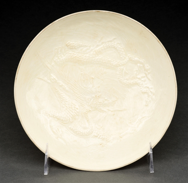 DING YAO MING DYNASTY MOLDED DRAGON WHITE PORCELAIN DISH.