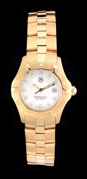 LADYS 18K GOLD TAG HEUER EXCLUSIVE MOTHER OF PEARL & DIAMOND WATCH.