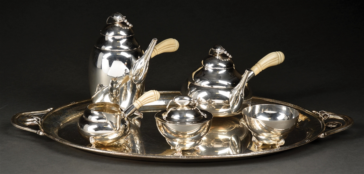 A FIVE PIECE STERLING TEA AND COFFEE SERVICE. 
