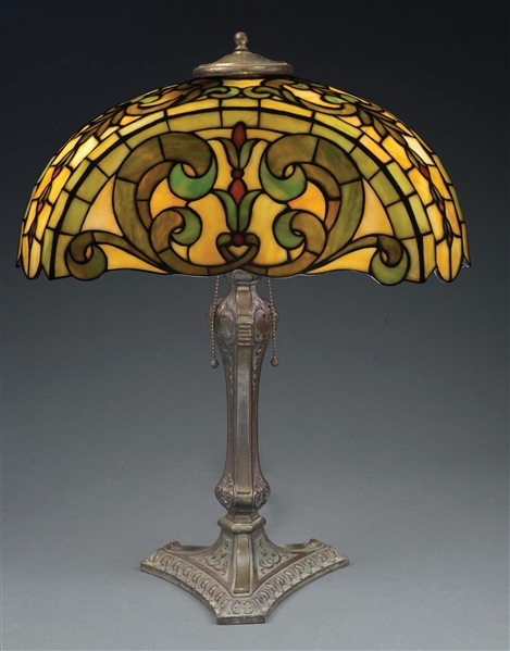 DUFFNER AND KIMBERLY LEADED GLASS LAMP WITH 3-SIDED SHADE.