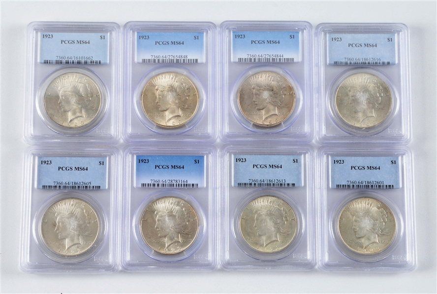LOT OF 20: GRADED PEACE SILVER DOLLARS.