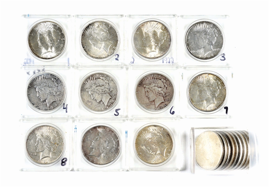 LOT OF 21: PEACE SILVER DOLLARS.