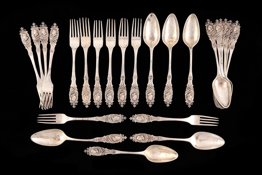 A SET OF TWELVE TABLE FORKS AND TWELVE SPOONS. 
