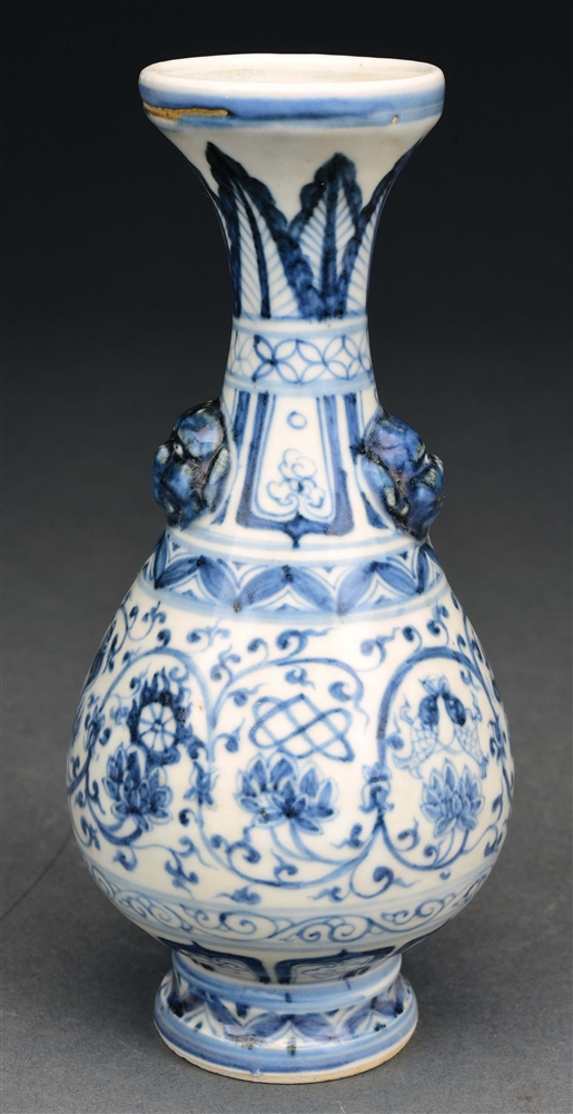 CHINESE BLUE AND WHITE VASE WITH MYTHICAL HEAD HANDLES.